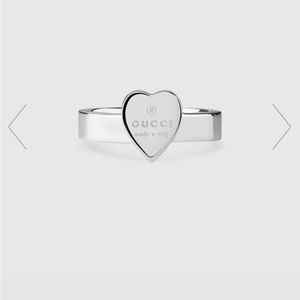 GUCCI Trademark ring with heart pendant.